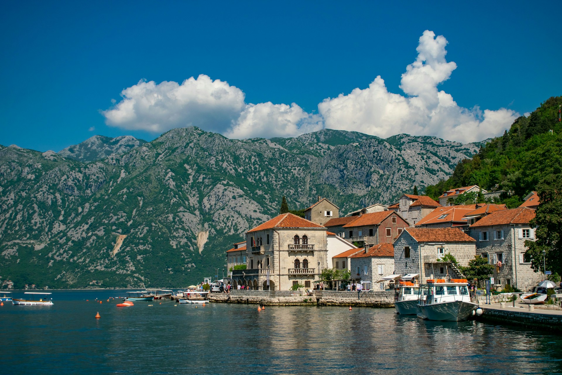 View of Kotor Old Town and the Bay of Kotor surrounded by mountains in Montenegro